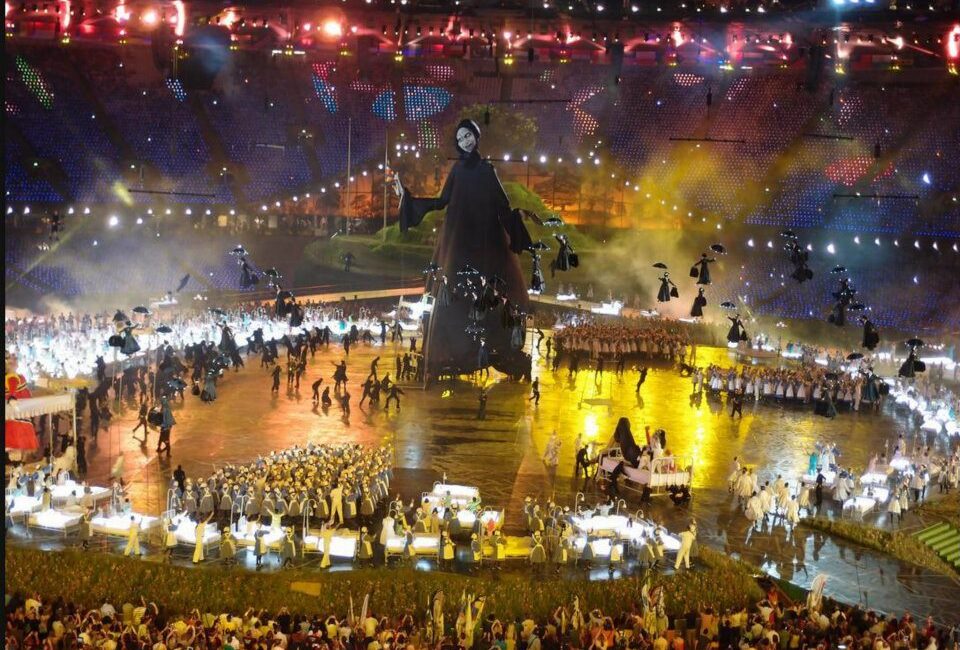 Olympic stadium opening ceremony stage with a giant figure of Voldemot and dementors around him