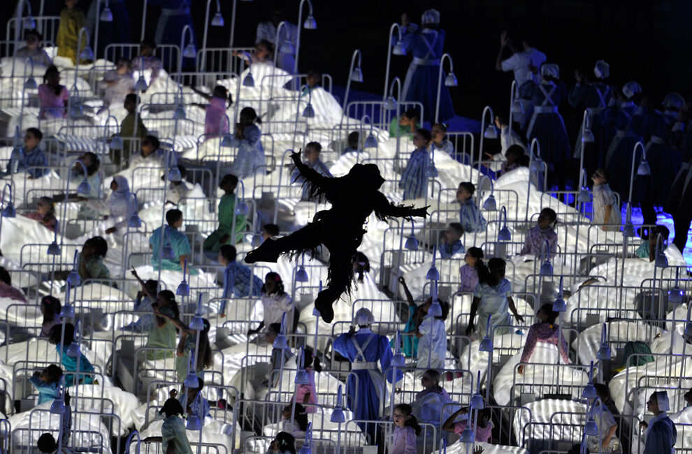 An actor dressed as a Dementor flying over the stadium