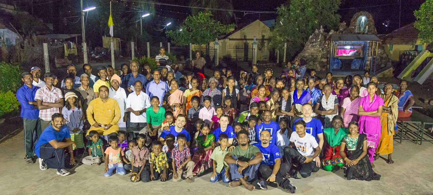 Performers and the village residents after a workshop